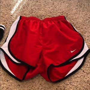 Red and black nike shorts